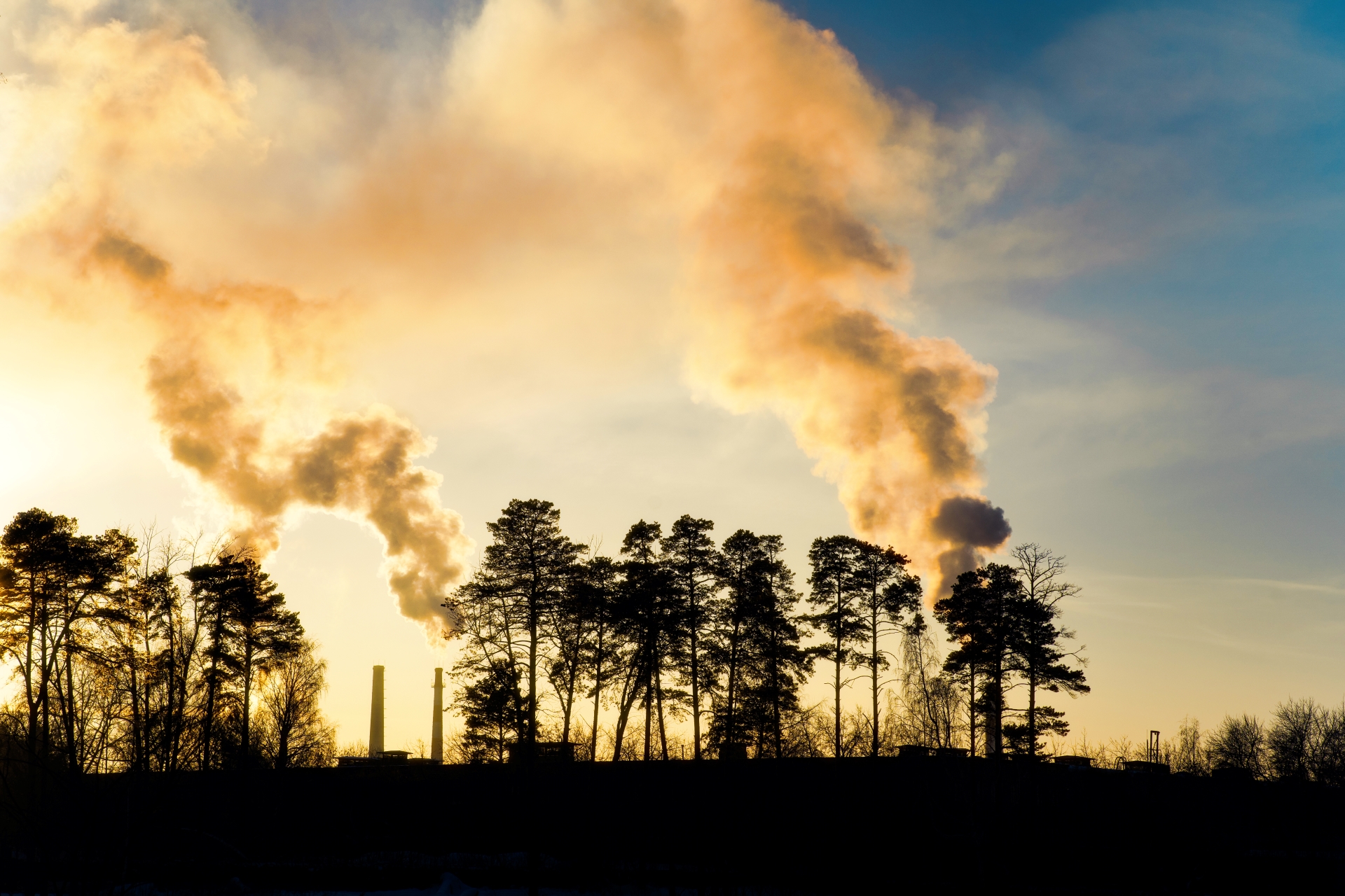 industrial chimneys releasing